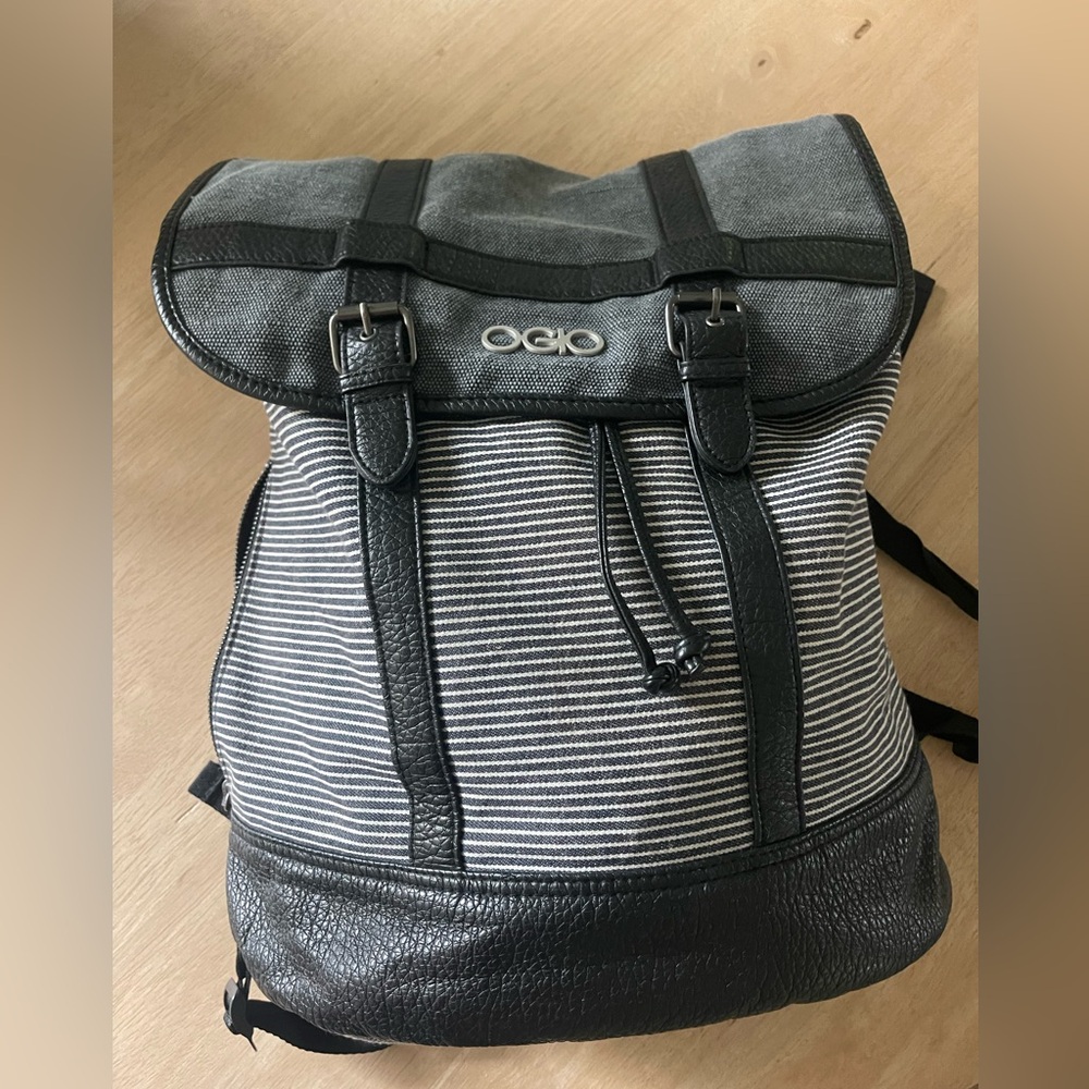 OGIO Backpack. Black grey striped. Canvas material. Zipper pockets, laptop.
